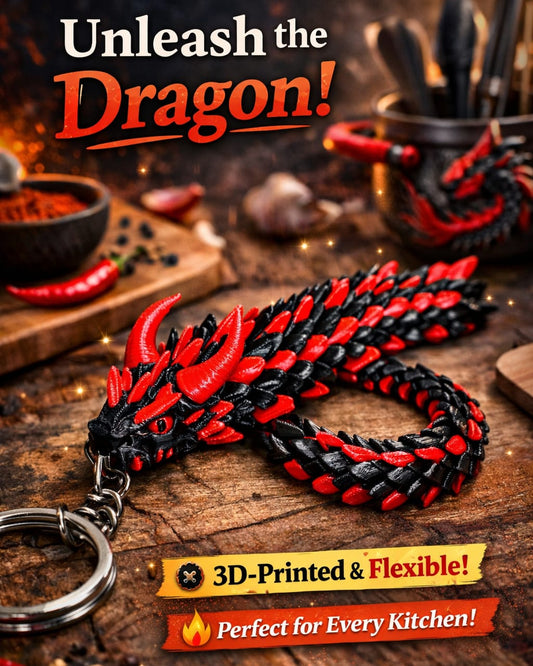 Red and black dragon-shaped keychain on a wooden surface with kitchen items in the background.